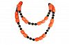 A Gold, Coral, Diamond and Onyx Necklace, Earrings and Ring Suite
