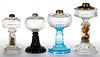 ASSORTED GLASS KEROSENE STAND LAMPS, LOT OF FOUR