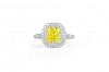 A Tiffany & Co. Platinum, Gold, Diamond and a Fancy Vivid Yellow Diamond Ring