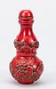 Snuff Bottle ''The Pair of Cranes of Pine Peak'', China, c. 1900, carved red lacquer with decoration of cranes in pine mountain, h 8cm