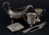 George III Irish silver sauce boat with beaded rim on the three hoof feet, maker's mark rubbed, Dublin, 1810, cigarette case,