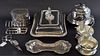 Silver plated tea caddy, entree dish and cover. candle snuffer with tray, toast rack, muffin dish and pair of bowls in a stan