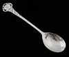 Modern silver spoon in the style of Omar Ramsden with pierced and moulded terminal, cancelled marks, re-assayed marks for Lon