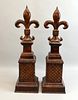 Pair of 20th century garnitures in the from of fleur de lys 40cm