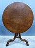 Round Gothic mahogany tilt top table 67cm diameter