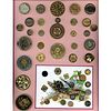 A FULL CARD OF ASSORTED METAL FLOWER BUTTONS