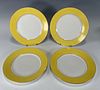 FOUR YELLOW RIMMED LIMOGES PLATES