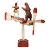 An American Folk Art Carved Wood and Polychrome Whirligig, Height 29 x length 41 1/2 inches.