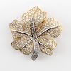 Approx. 8.0-9.0 Carat Pave Set Round Brilliant Cut and Baguette Cut Diamond, Platinum and 18 Karat Yellow Gold Leaf Brooch