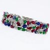 Cartier style 55.50 Carat Carved Emerald, Ruby and Sapphire and 9.15 Carat Round Brilliant Cut Diamond and 18 Karat White Gol