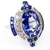 Art Deco style Approx. 1.0 Carat Round Brilliant Cut Diamond, 2.0 Carat Round and Baguette Cut Sapphire and Platinum Ring