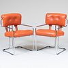 Pair of Guido Faleschini Chrome and Orange Leather Upholstered 'Tucroma' Chairs