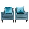 Modern turquoise velvet-upholstered arm chairs, each with curved back and straight sides with drop in cushion on two straight legs and two splayed leg