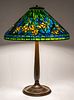 Tiffany Studios "Daffodil" Art Nouveau table lamp designed by Clara Driscoll, leaded glass and bronze, the shade impressed "Tiffany Studios New York 1