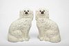 Pair of Modern White-Glazed Staffordshire Pottery Figures of Seated Spaniels