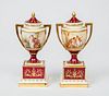 Pair of Vienna Porcelain Small Urns, Covers and Stands