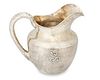 Clemens Friedell (1872-1963), An Arts & Crafts hammered sterling silver pitcher, early 20th century