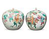 A near-pair of Chinese Qing Dynasty porcelain lidded vessels