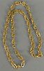 18K gold chain with round and oval links. lg. 33in. 47.2 grams