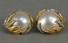 14K clip on earrings, set with large pearls, fern design and ten diamonds. 
total weight 19.4 grams