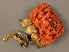 14K gold and coral brooch carved coral in form of large flower set with four small diamonds. 
ht. 3 1/2in., total weight 46.8