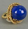 18K ring with large cabochon cut lapis, ring in rope design.  total weight 19.5 grams