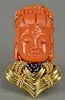 18K gold brooch/pendant with red coral carved head having sapphires and gold collar.  ht. 1 1/2in.