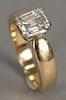 14K gold ring with emerald cut diamond, approximately 2 cts.