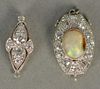 Two necklace clasps, one clasp set with center oval opal surrounded by twelve diamonds (opal chipped) and one clasp with six 