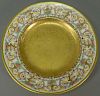 Set of twelve Minton luncheon plates with encrusted gold center and fruit basket border. 
dia. 9 in.