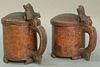 Two Scandinavian burlwood tankards 18th/19th century, each having hinged covers with carved lion thumb piece over handle atta