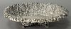 English silver oval footed bowl with fruit and floral embossed reticulated sides. 
ht. 3in., lg. 11 1/2in., wd. 8 3/4in. 
13.