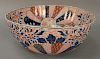 Imari porcelain punch bowl with ruffled edge.  (5inch crack from top)  ht. 7 1/2in., dia. 19in.