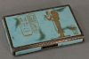 Egyptian sterling silver enameled snuff box having gilt Egyptian figure and hieroglyphics with gold wash interior. 
ht. 2in.,