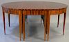 Custom mahogany Federal style three part dining table having central drop leaf table and two demilune ends all set on square 