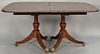 Fineberg mahogany dining table with carved rope edge on double pedestal base with two 18 inch leaves and custom pads. 
ht. 29