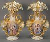 Pair of Victorian large French porcelain vases, each having molded gilt flowers and painted panel with two women.  (one repai