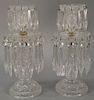 Pair of Anglo Irish Regency crystal candle sticks. 
(one repaired) 
ht. 11 1/2in. 
Provenance: Tho. Livingston Antiques, San 