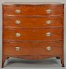 English mahogany bow front chest having rectangular top over four long graduated drawers on flared French feet.  ht. 41in., w