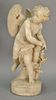 Carved alabaster figure of cupid grabbing his arrow, signed Houry. ht. 27in., wd. 11in., dia. of base 9in.