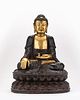A parcel-gilt bronze figure of Buddha, Ming dynasty