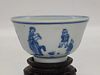 A Blue and White "Teaching Child" Tea Cup - Qing Dynasty