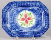 Blue spatter platter with four petal flower