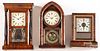 Three rosewood mantle clocks