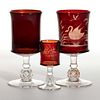 PAVONIA - RUBY-STAINED DRINKING ARTICLES, LOT OF THREE