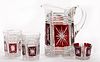 STAR-IN-SQUARE - RUBY-STAINED DRINKING ARTICLES, LOT OF FOUR