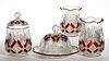 CHAMPION (OMN) - RUBY-STAINED FOUR-PIECE TABLE SET