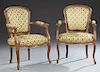Pair of French Carved Walnut Fauteuils, early 20th