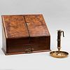 English Mahogany Stationery Box and a Telescoping Brass Candlestick