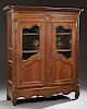 French Carved Cherry Bookcase, 19th c., the steppe